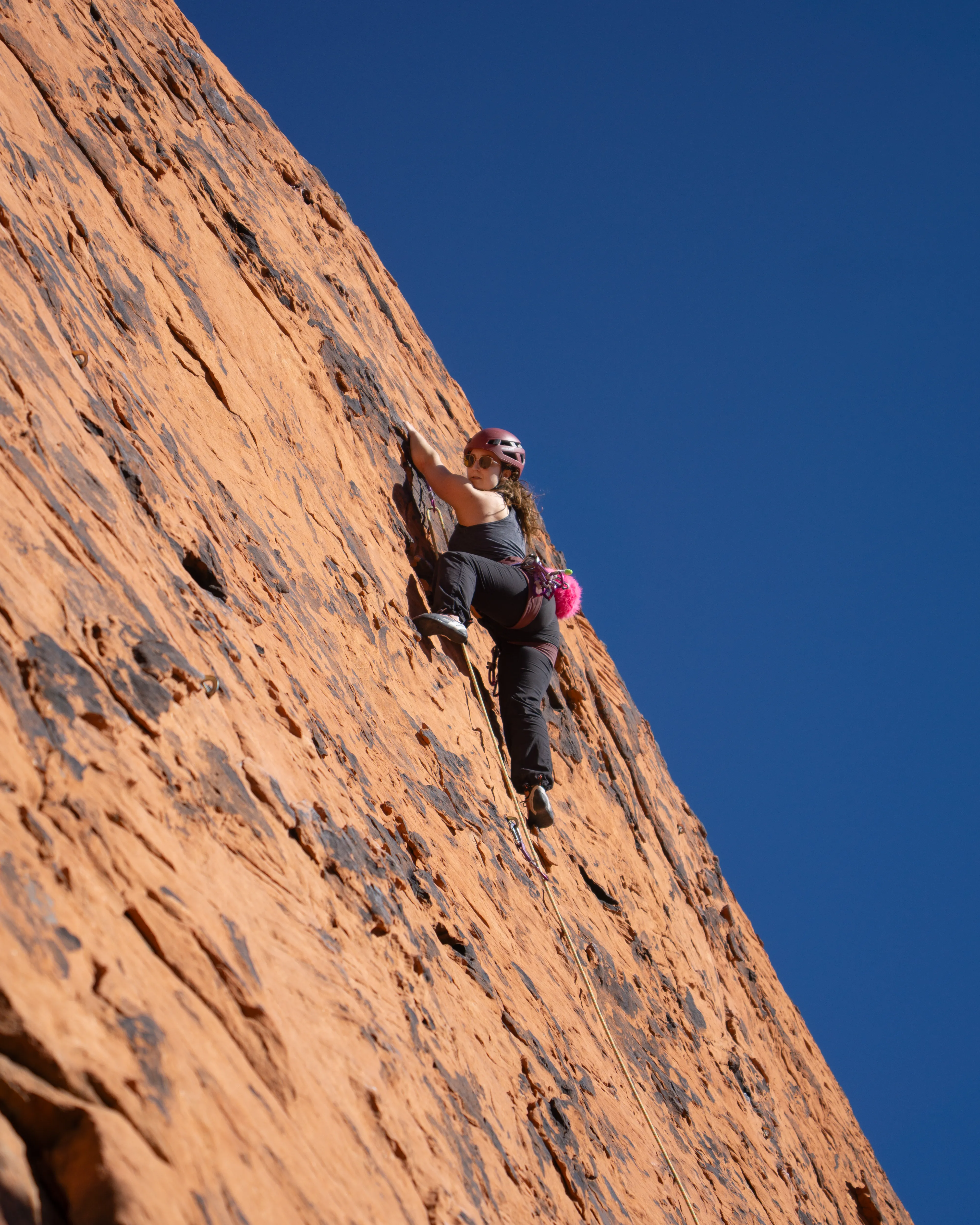 Andrea leading a climb.